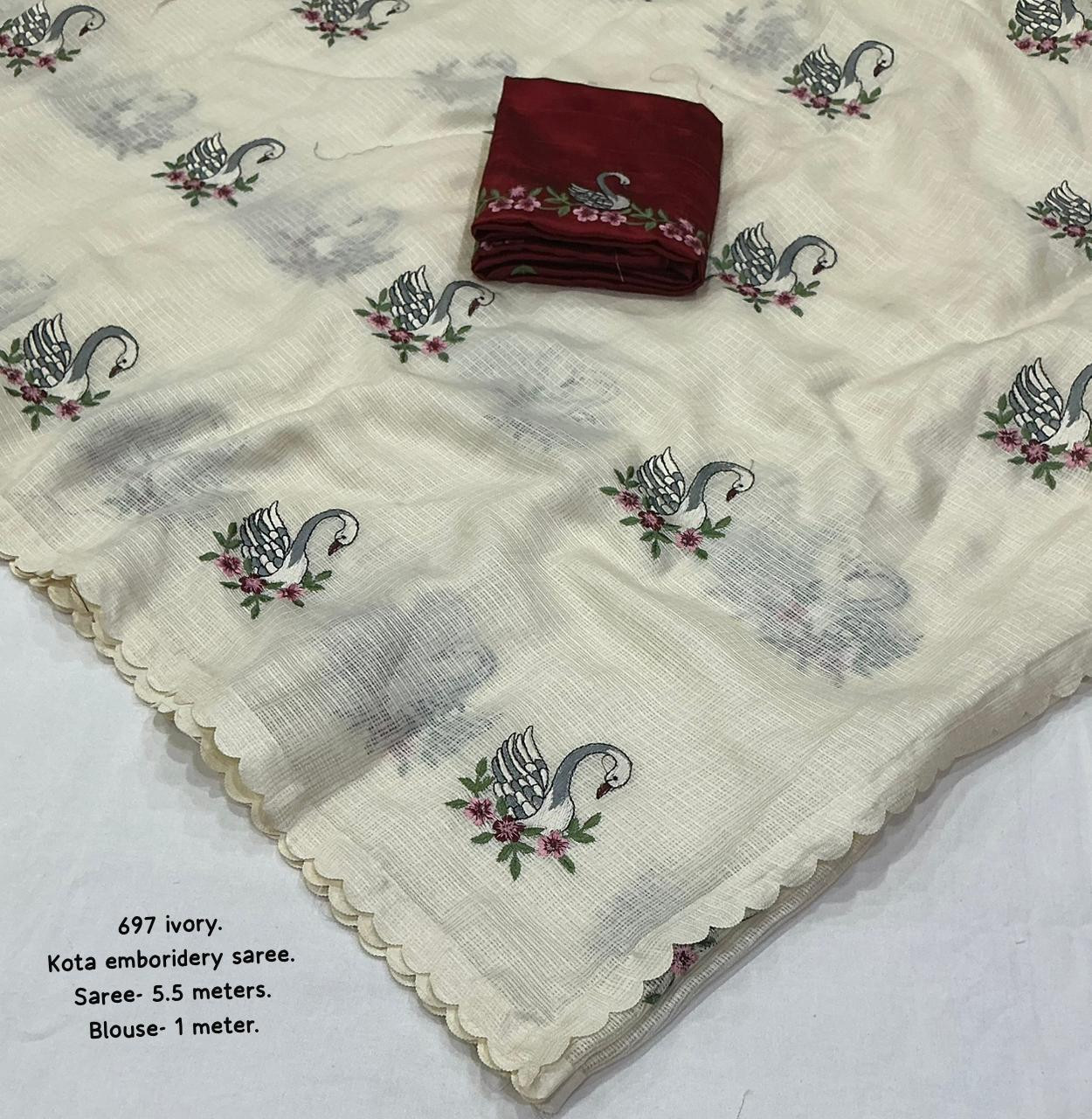 Soft kota doria saree with swan emboridery buttas .